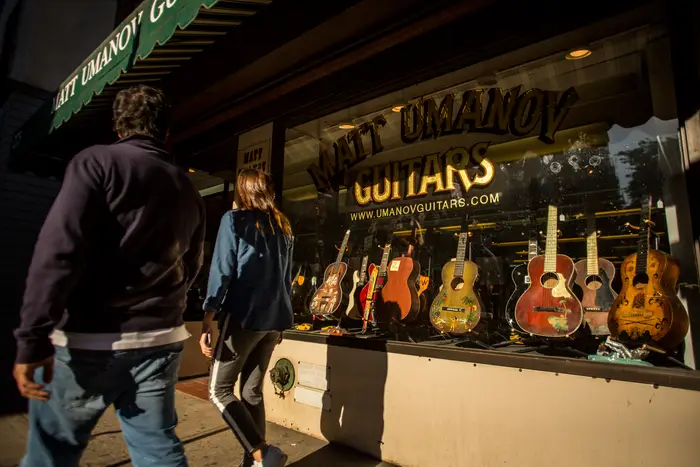 The window display at Matt Umanov Guitars on Bleecker Street.